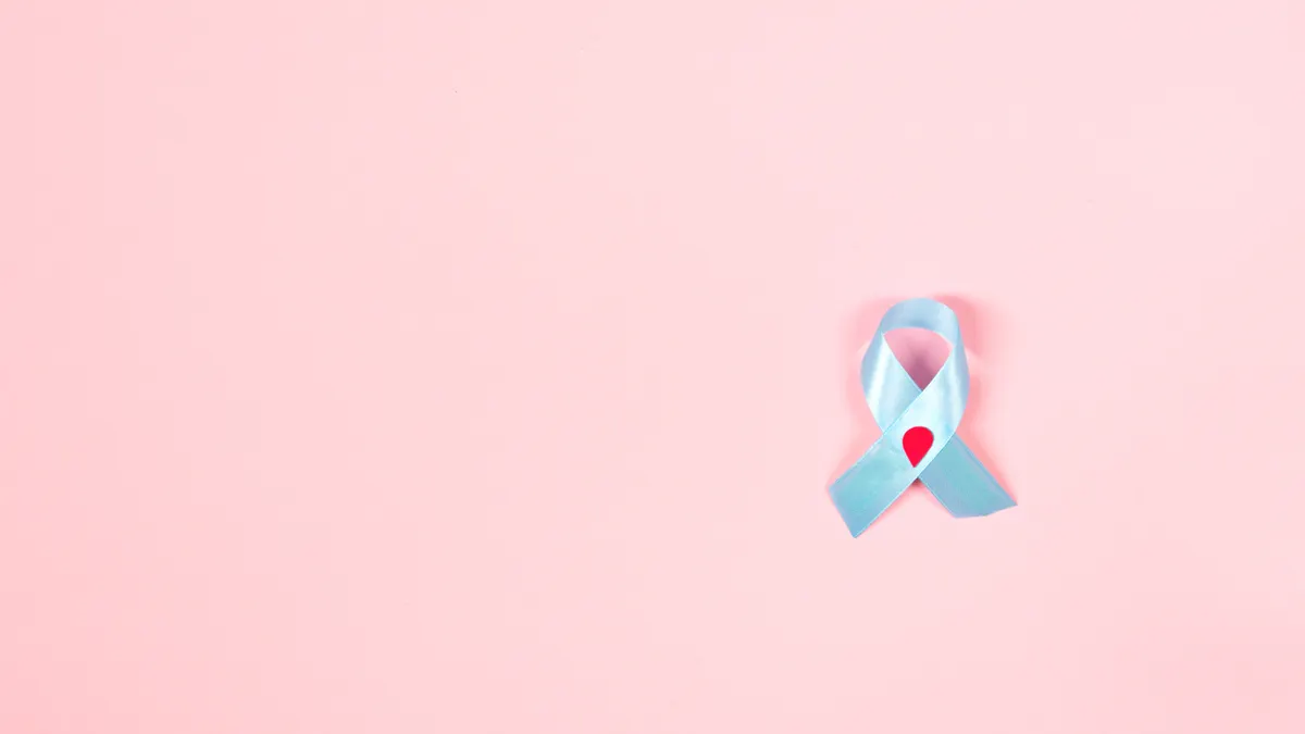 Addressing Emotional Well-being with Gestational Diabetes — Blue Diabetes Awareness Ribbon With Decorated Blood Drop on