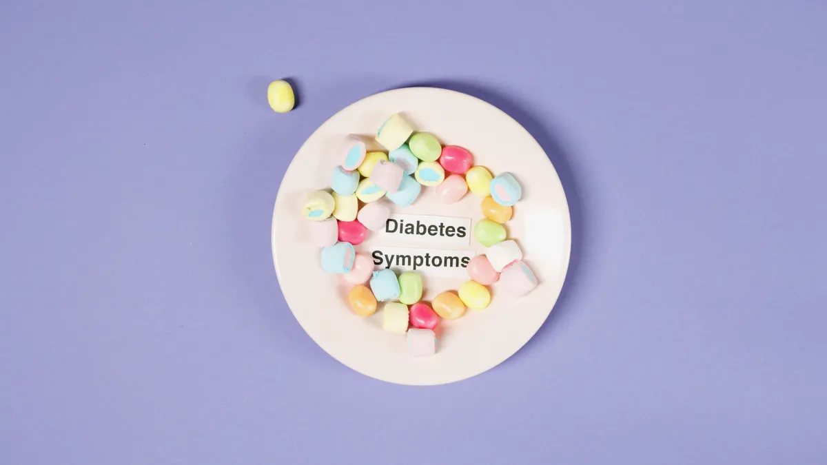 Gestational Diabetes Diet: What to Eat and What to Avoid — Candies on Plate with Concept on Diabetes Symptoms