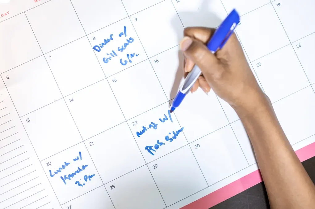 Hand writing on a monthly calendar
