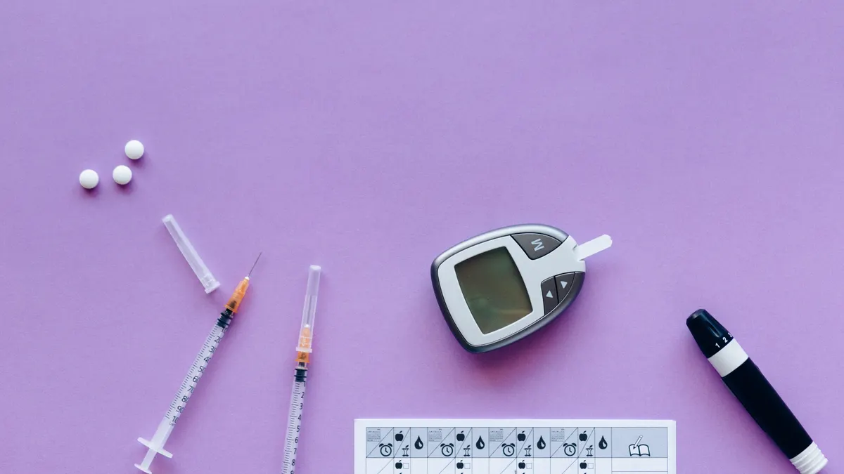 Insulin for Gestational Diabetes: When It Is Needed — Diabetic Kit and Medicines over a Purple Surface